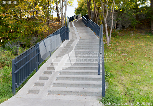 Image of stair case with railings in autumn park