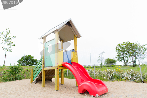 Image of slide on playground outdoors