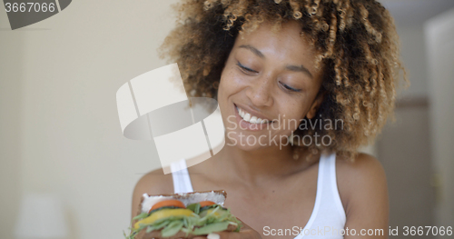 Image of Woman Having Breakfast In Bed