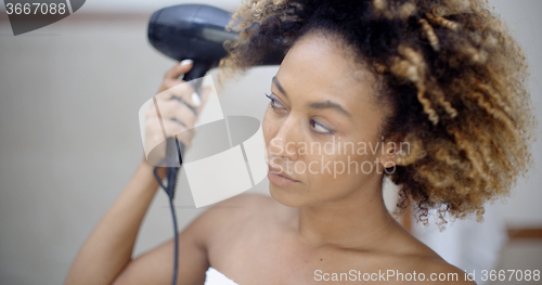 Image of Attractive Girl Dries Hair