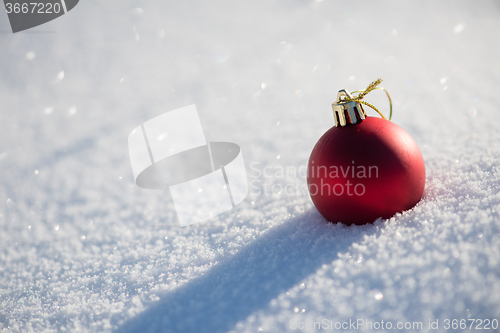 Image of christmas ball in snow