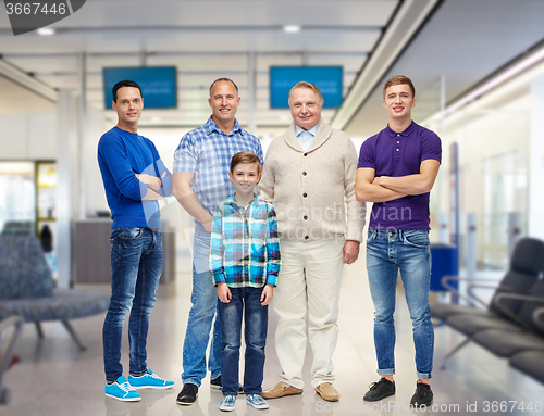 Image of group of smiling men and boy