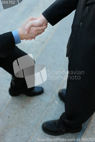 Image of Businessman Stepping Up