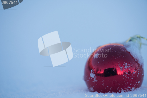 Image of christmas ball in snow