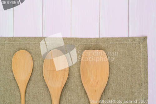 Image of Kitchenware on beige towel