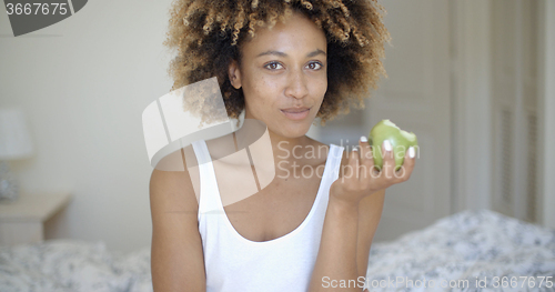 Image of Beautiful Young Girl With Apple