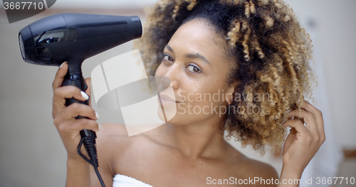 Image of Attractive Girl Dries Hair