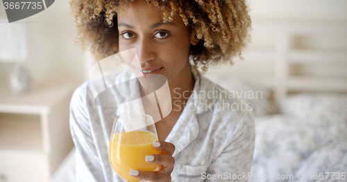 Image of African-American Girl Drinking Juice
