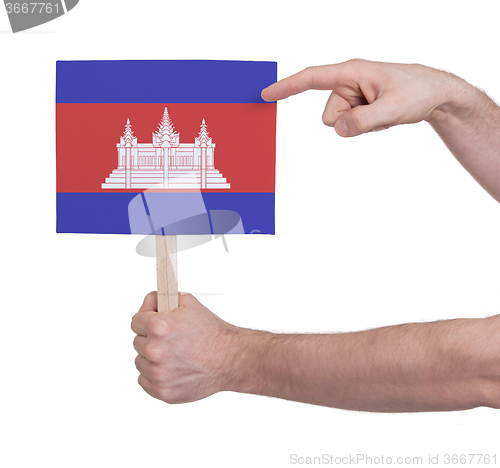 Image of Hand holding small card - Flag of Cambodia