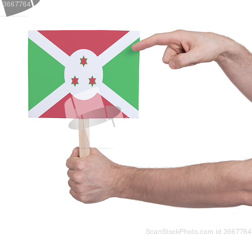 Image of Hand holding small card - Flag of Burundi