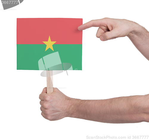 Image of Hand holding small card - Flag of Burkina Faso