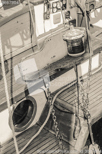 Image of Close up of a deck of old sailing ship, sepia