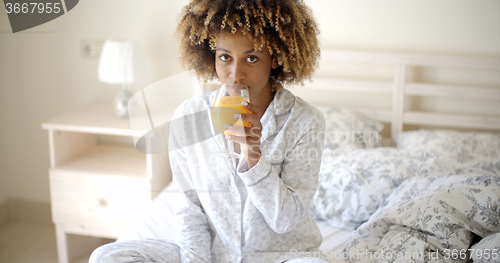 Image of African-American Girl Drinking Juice