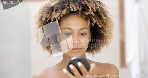 Image of Girl With Makeup Brush