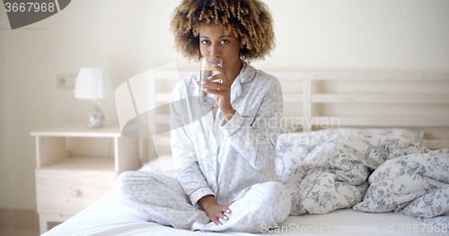 Image of Girl Drinks Fresh Water