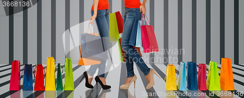Image of close up of women with shopping bags