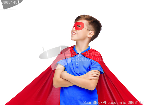 Image of boy in red super hero cape and mask