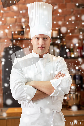 Image of happy male chef cook in restaurant kitchen