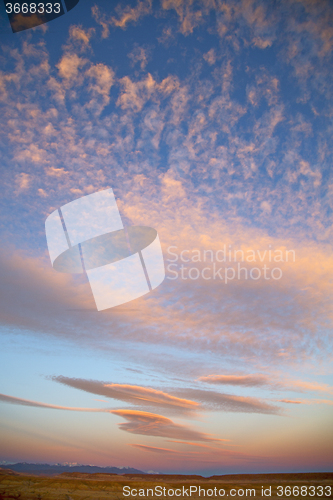 Image of sunrise in the colored sky   background