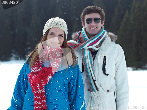 Image of romantic young couple on winter vacation
