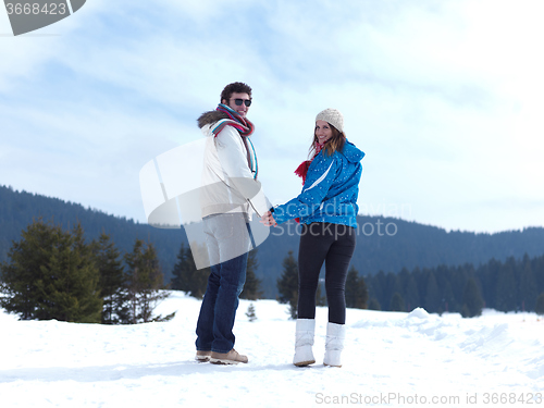 Image of romantic young couple on winter vacation