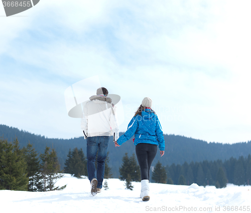 Image of romantic young couple on winter vacation