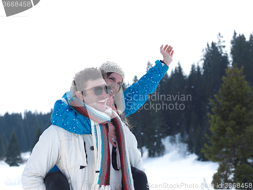 Image of romantic young couple on winter vacation