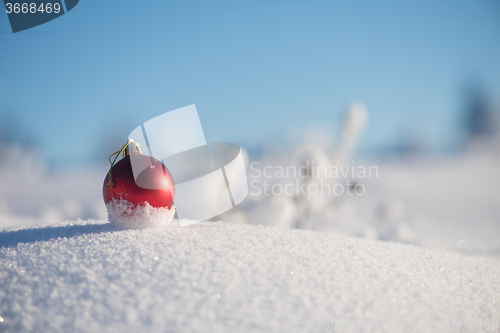 Image of christmas ball in snow