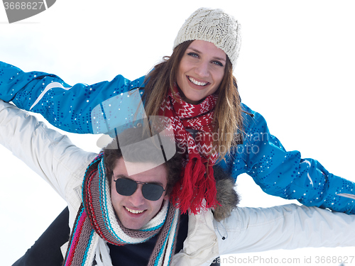 Image of romantic young couple on winter vacation