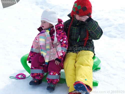 Image of portrait of boy and baby girl on winter vacation