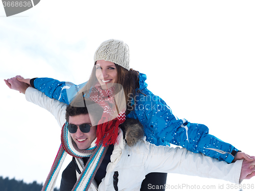 Image of romantic young couple on winter vacation