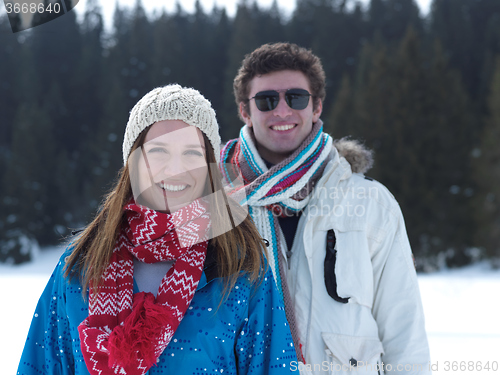 Image of romantic young couple on winter vacation