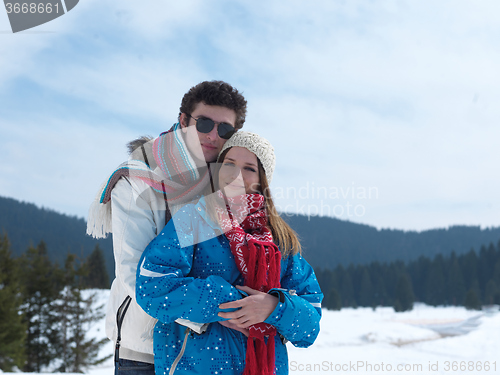 Image of romantic young couple on winter vacation