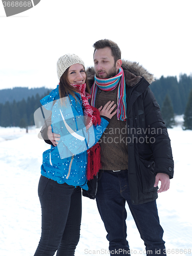Image of romantic young couple on winter vacation