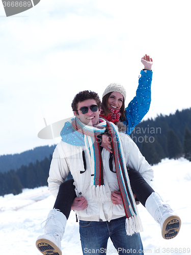 Image of romantic young couple on winter vacation