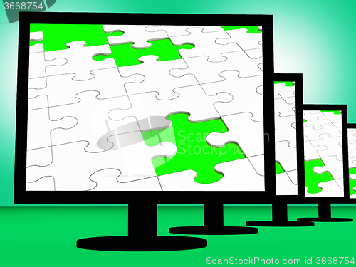 Image of Unfinished Puzzle On Monitors Shows Missing Pieces