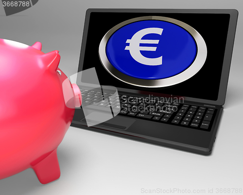 Image of Euro Symbol Button On Laptop Showing Savings