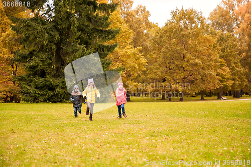 Image of group of happy little kids running outdoors