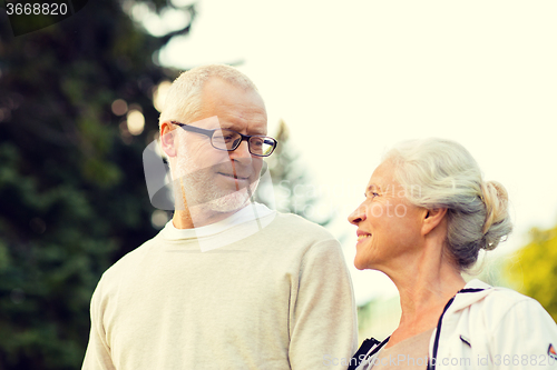 Image of senior couple in city park