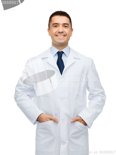 Image of smiling male doctor in white coat