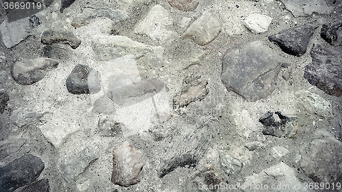 Image of Road surface paved with rough stones