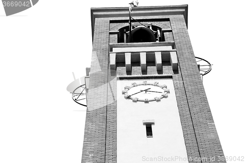 Image of ancien clock tower in italy europe old  stone and bell