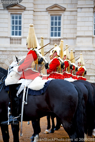 Image of in london england horse and cavalry    the queen