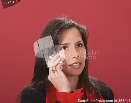 Image of Brunette on the phone