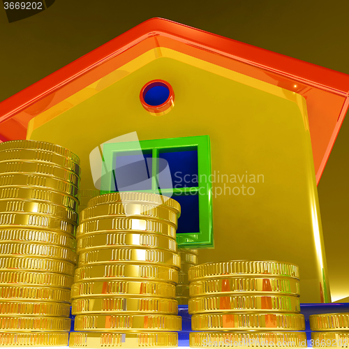 Image of Coins Around House Showing Paying Rent