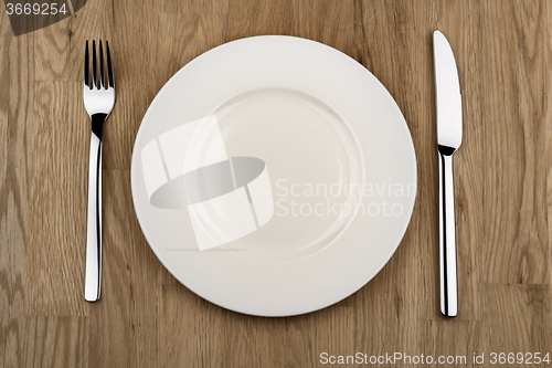 Image of plate, knife and fork