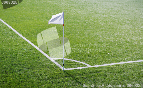 Image of close up of football field corner with flag marker