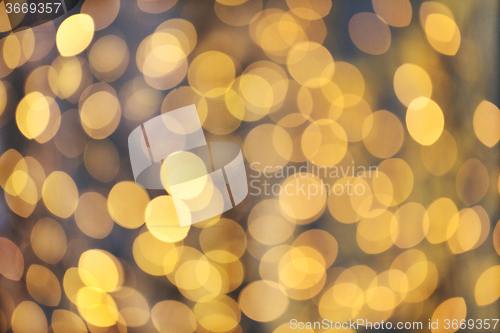 Image of blurred golden lights bokeh