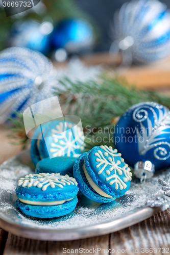 Image of Cakes with decoration in the form of snowflakes.