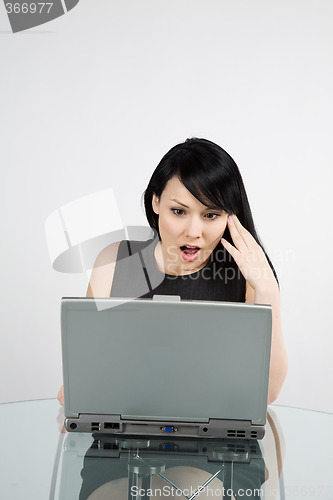 Image of Working businesswoman